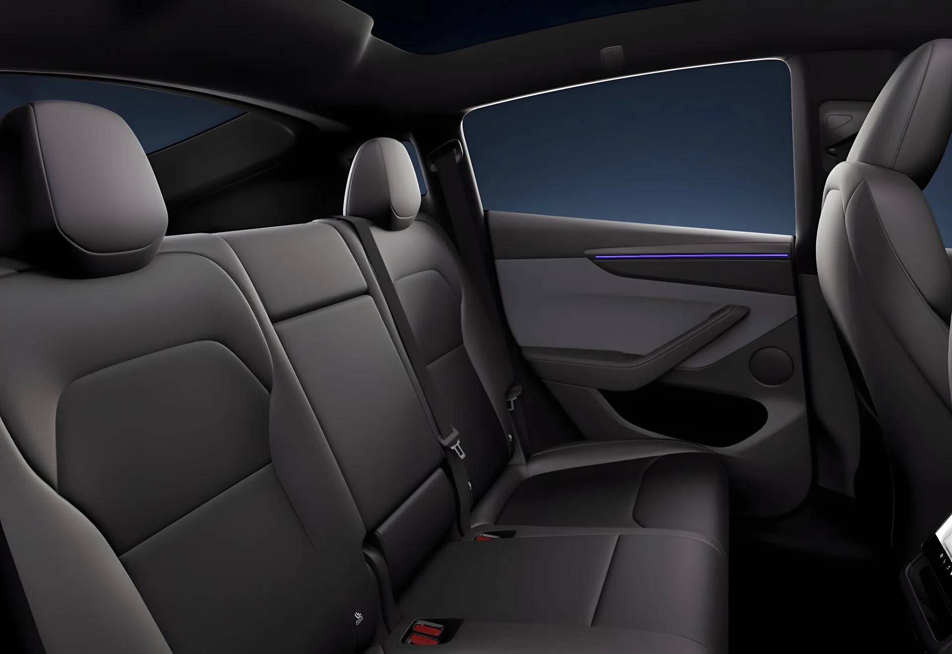 Banquette arrière de la Tesla Model Y Premium, toit panoramique en verre